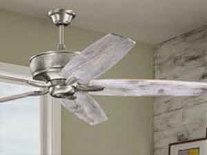 Ceiling fan with white smoked fan blades.
