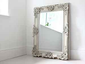 Mirror with victorian silver frame.