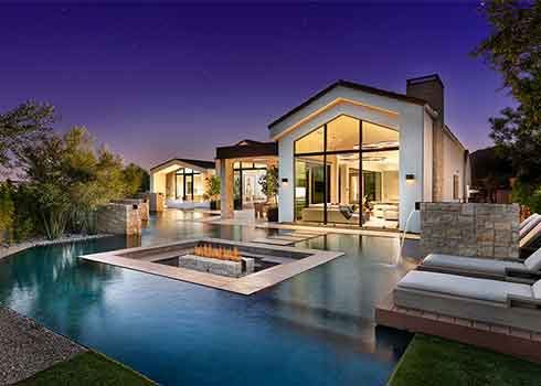 Backyard view of a luxurious Paradise Valley home with pool. Residential window cleaning.